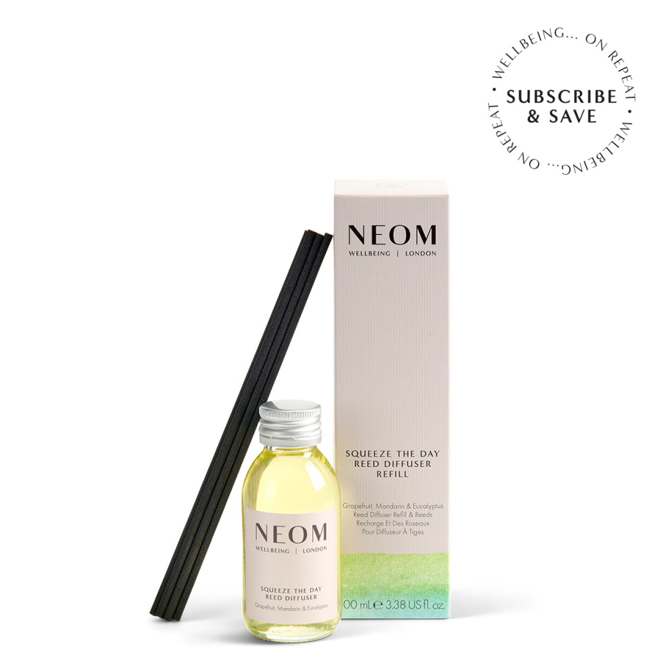 NEOM diffuser bottle and packaging on a white background