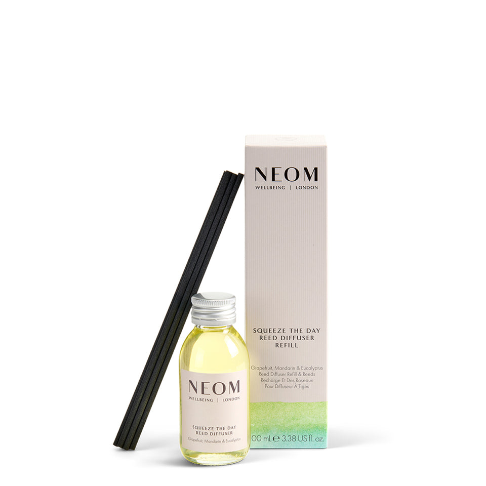 NEOM reed diffuser bottle and packaging on a white background