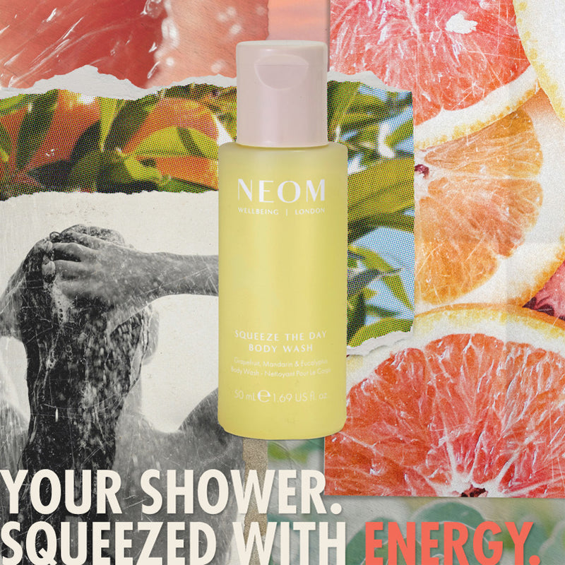 “NEOM Squeeze the Day Body Wash (50 ml) centered over a collage of grapefruit slices and a person showering. Text reads: ‘Your shower. Squeezed with energy.’”