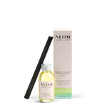 NEOM diffuser bottle and packaging on a white background