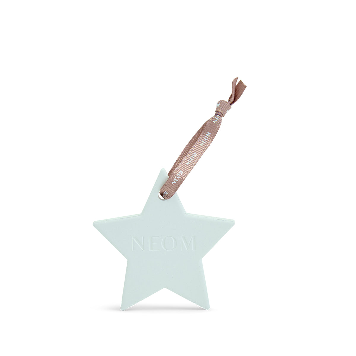 NEOM Star-shaped decoration with a pink ribbon on a white background