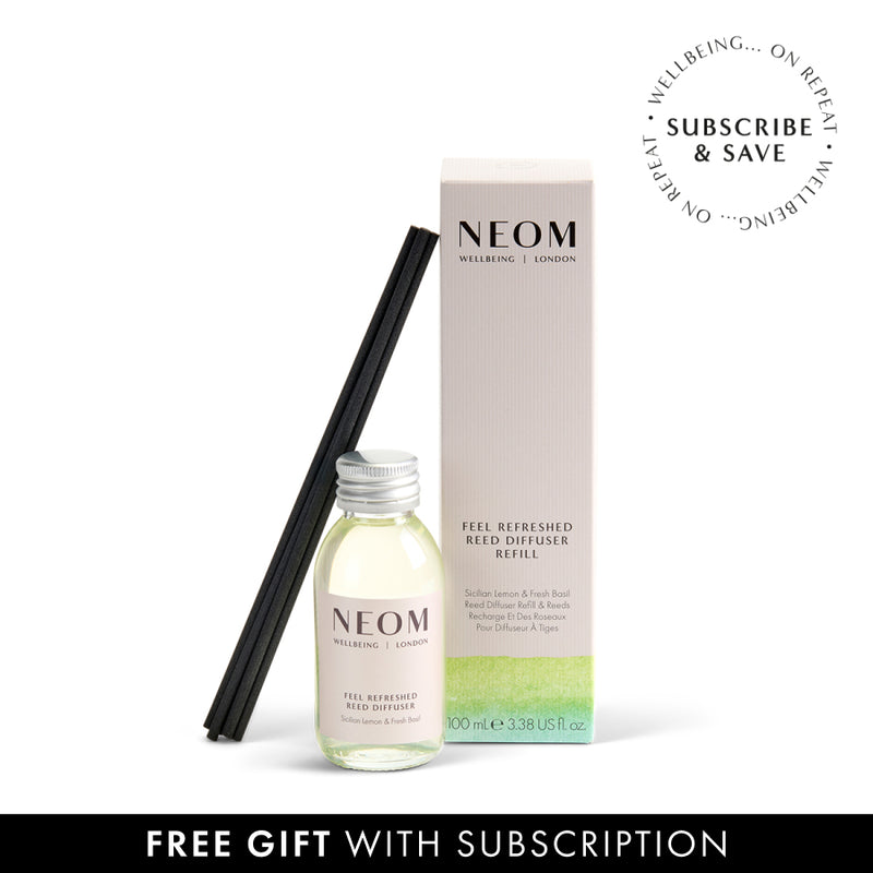 NEOM reed diffuser refill bottle and packaging on a white background