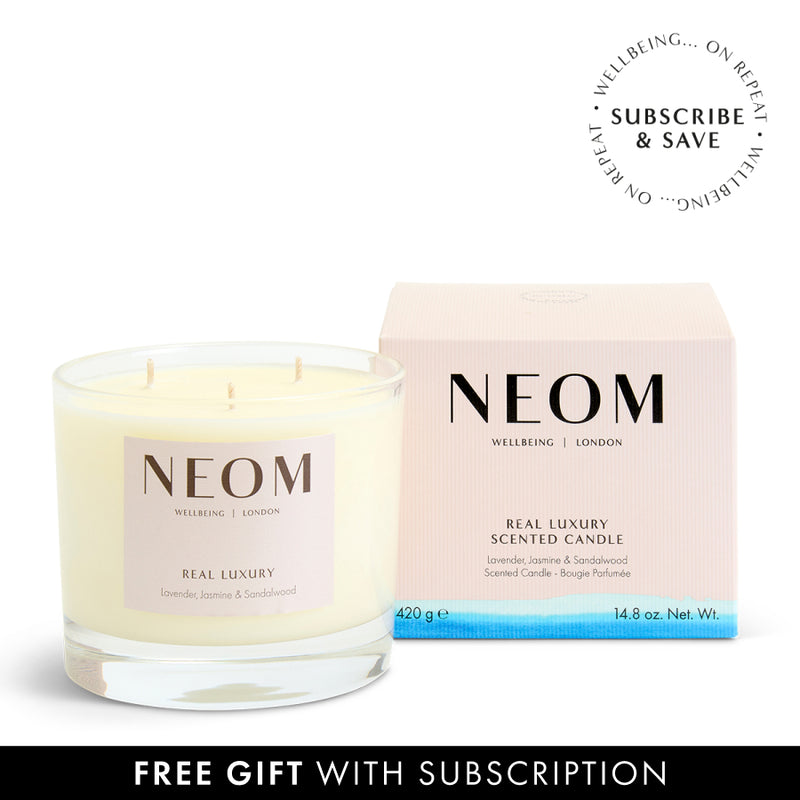 NEOM scented candle and packaging on a white background