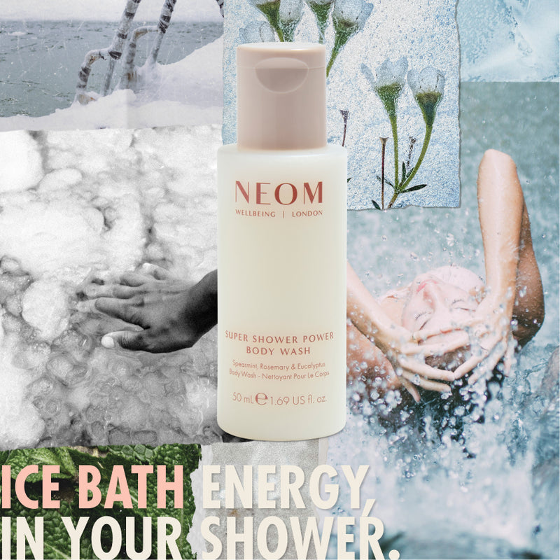 “NEOM Wellbeing Super Shower Power Body Wash (50 ml) bottle centered over a collage of icy water, foam, and a person under a shower. Text reads: ‘Ice bath energy in your shower.’”