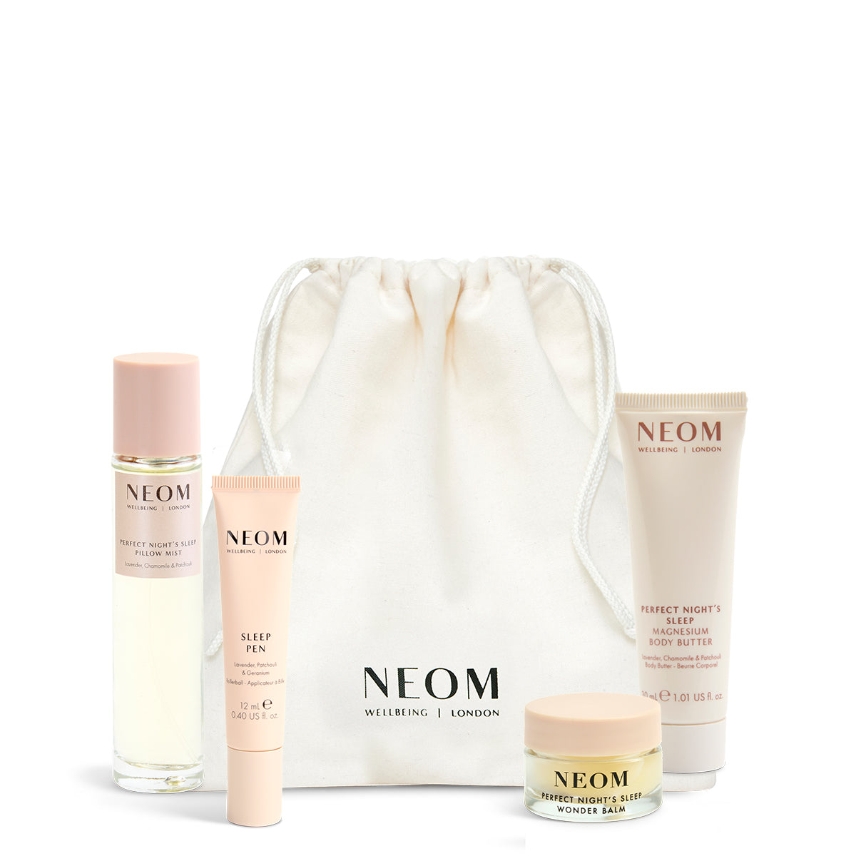 NEOM Sweet Dreams Travel Kit  including a pillow mist, sleep pen, wonder balm and body butter with a white drawstring bag on a white background.