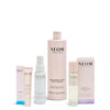 Collection of NEOM skincare products on a white background