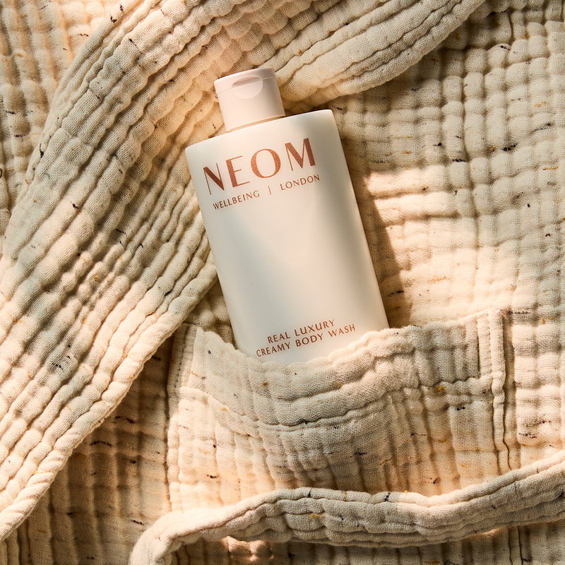 NEOM real luxury creamy body wash inside a pocket