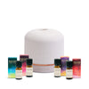 NEOM diffuser and essential oils on a white background