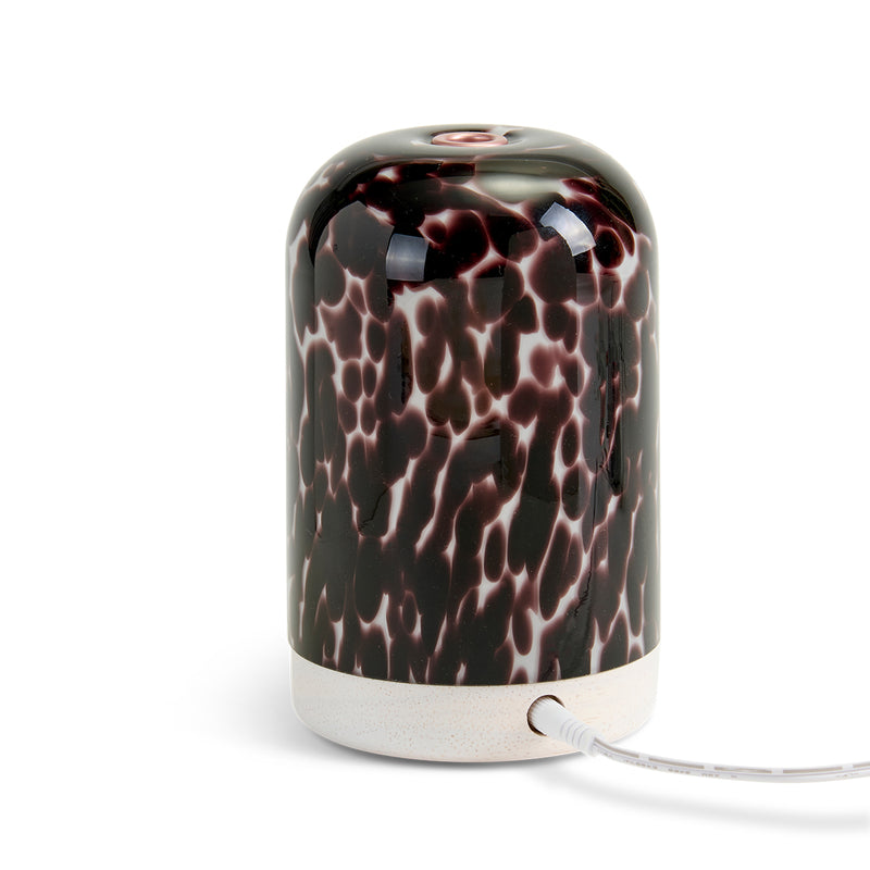 NEOM Tortoiseshell diffuser on a white background