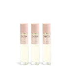 3 NEOM pillow mist bottles on a white background