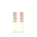 Two NEOM pillow mist bottles on a white background