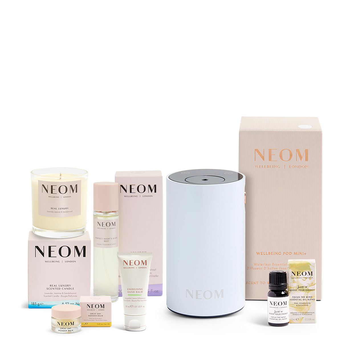 NEOM product range including candles, diffusers, essential oils, wonder balm and sleep mist on a white background