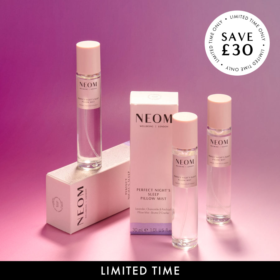 NEOM pillow mist products on a pink gradient background with a discount offer.