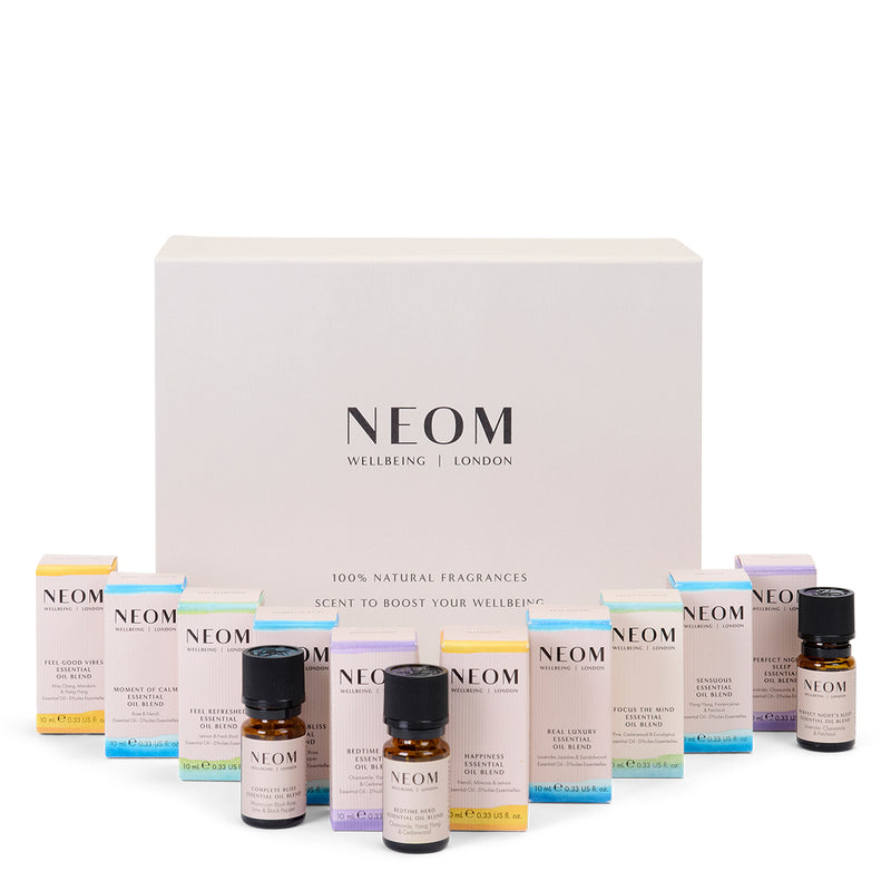 NEOM gift box and 10 essential oils on a white background