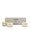 NEOM candle trio set with packaging on a white background