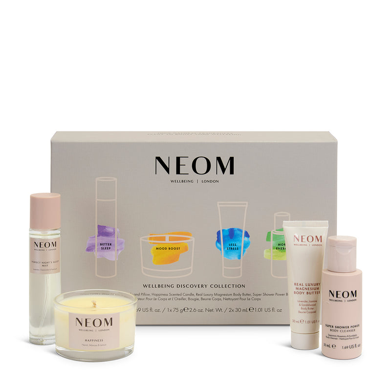 NEOM wellbeing discovery collection with various products on a white background
