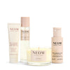 NEOM bath and body and wellness products on a white background