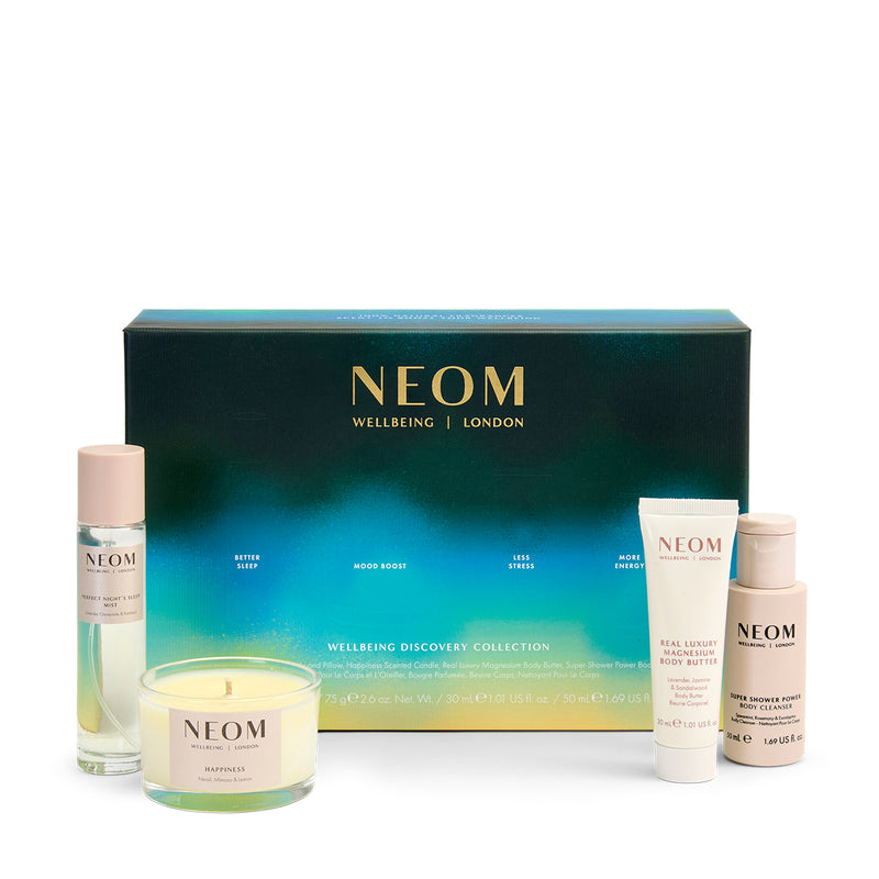 NEOM Wellbeing skincare and candle set on a white background