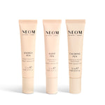 Three NEOM pens on a white background