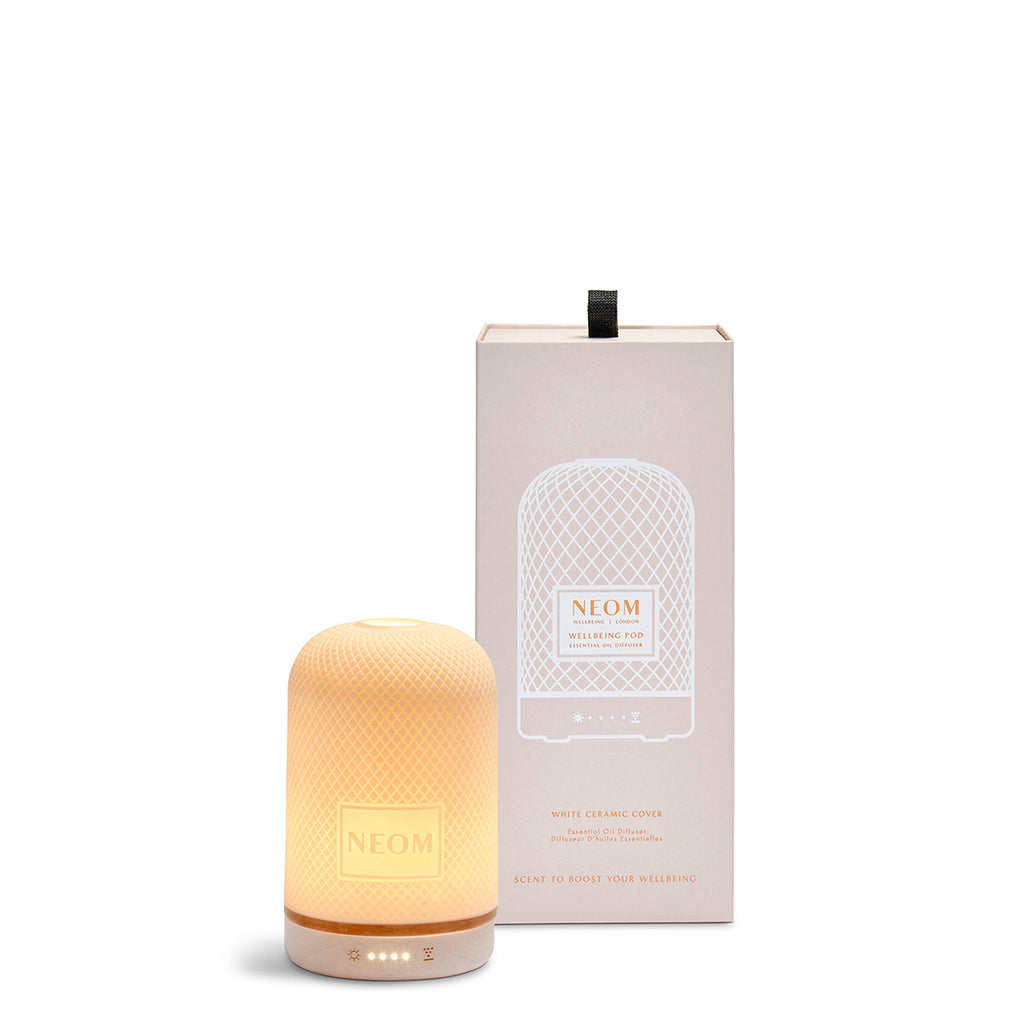 NEOM diffuser with packaging on a white background