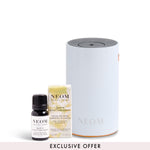 NEOM pod mini+ in white and focus the mind essential oil blend with ticker tape saying 