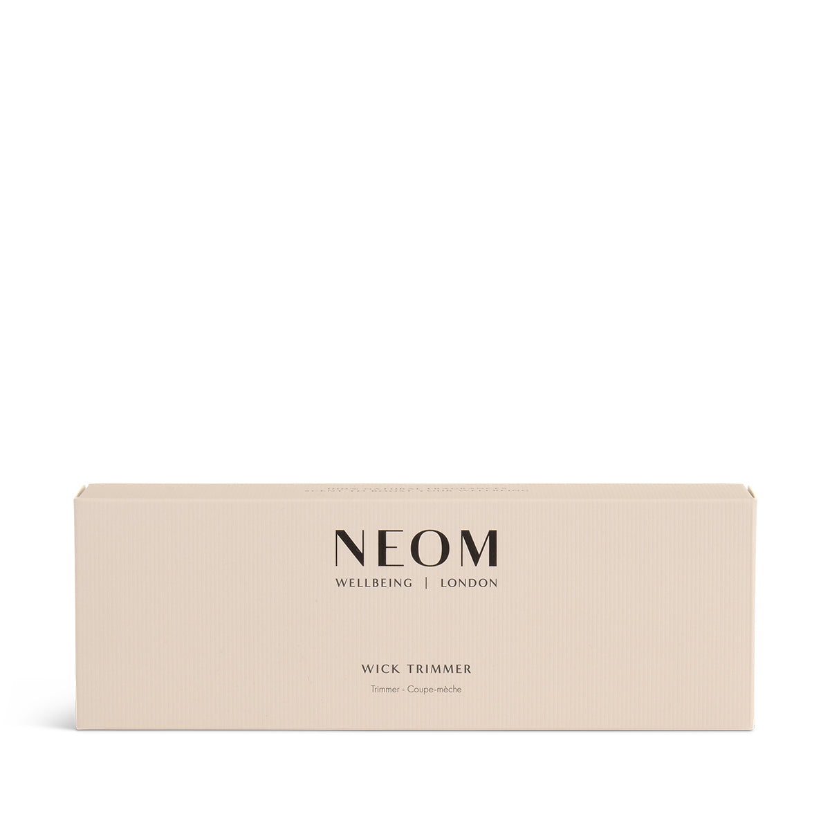 NEOM wick trimmer box with 'Wellbeing London' text on a white background
