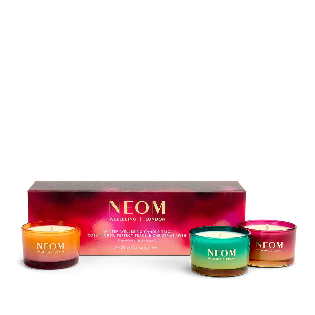 NEOM Winter Wellbeing Candle Trio with three Christmas travel candles and a box on a white background